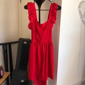 Red ruffle sleeve tie back dress